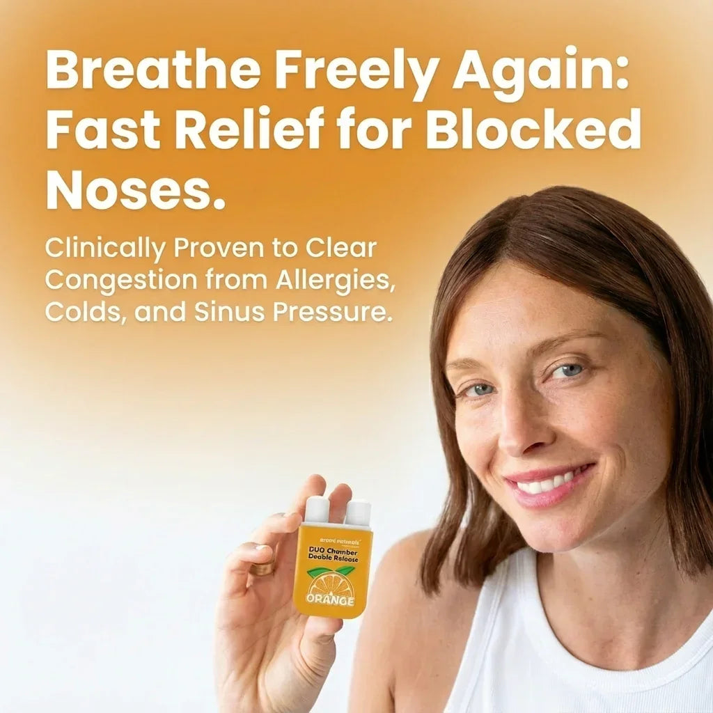Smiling woman holding orange-scented Duo Chamber Double Release nasal spray for fast relief of blocked noses
