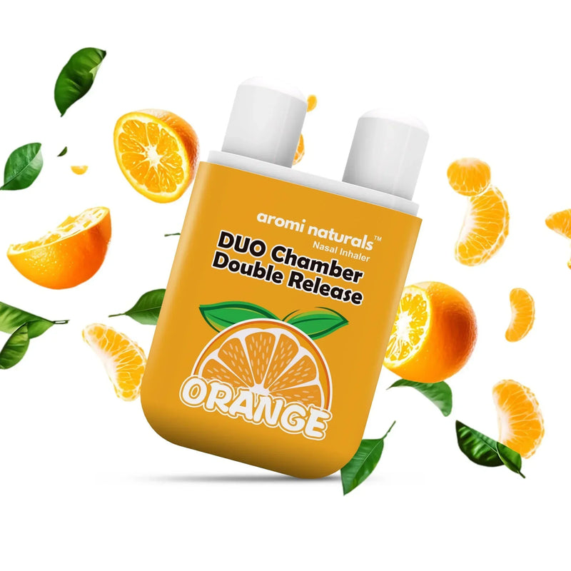 Aromi Naturals Duo Chamber Orange Nasal Inhaler with orange slices and green leaves around