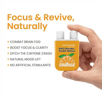 Hand holding Aromi Naturals Orange Duo Chamber nasal inhaler with focus and clarity benefits listed